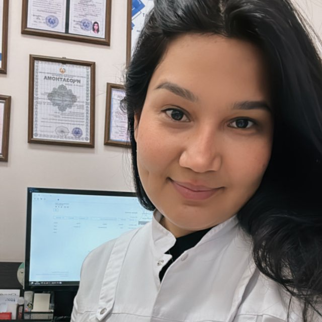 Dr. Karimova conducting comprehensive eye examination with modern diagnostic equipment in Dushanbe